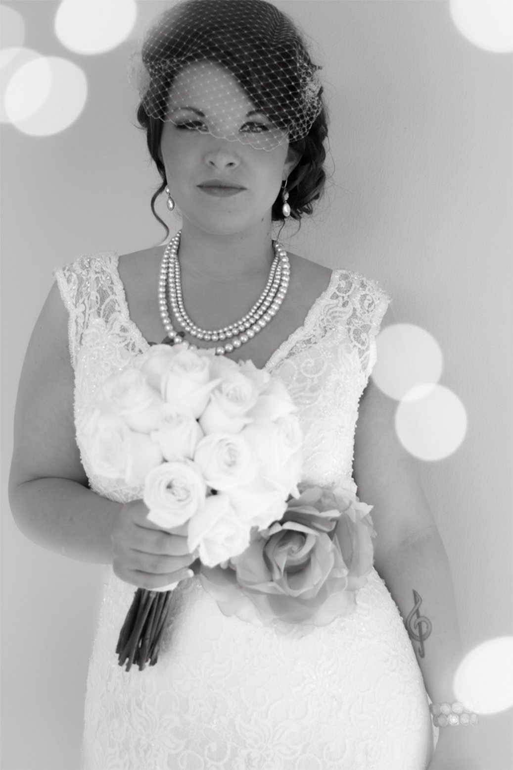 Black and white bridal portrait with a bouquet
